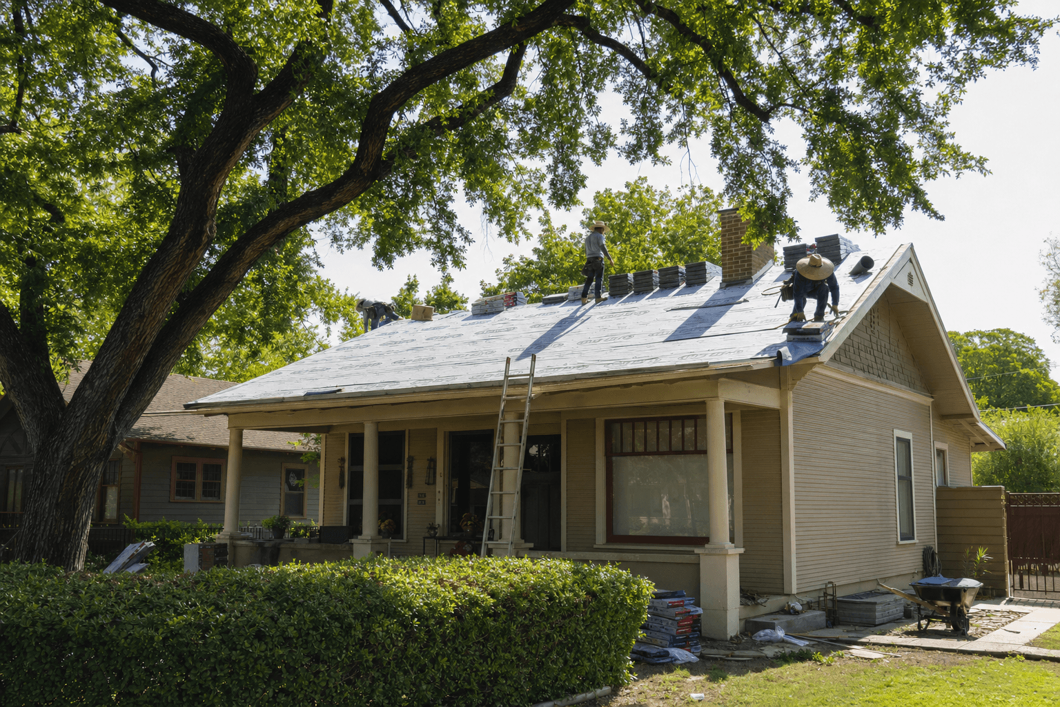 Architectural shingle installation in progress on an older Gilbert home